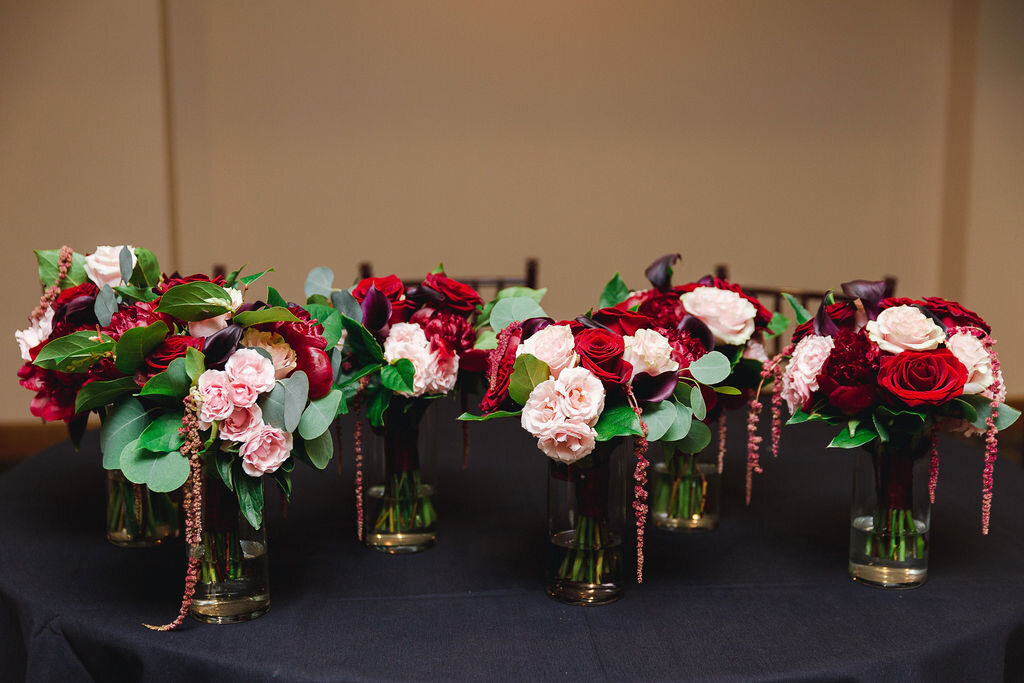 Burgundy and pink bridesmaids bouqets.