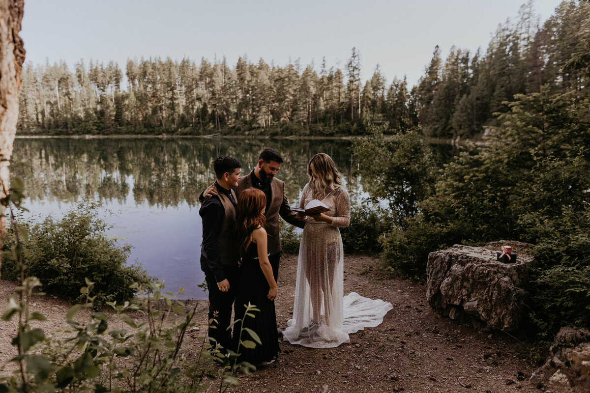 bride and groom with kids during wedding ceremony