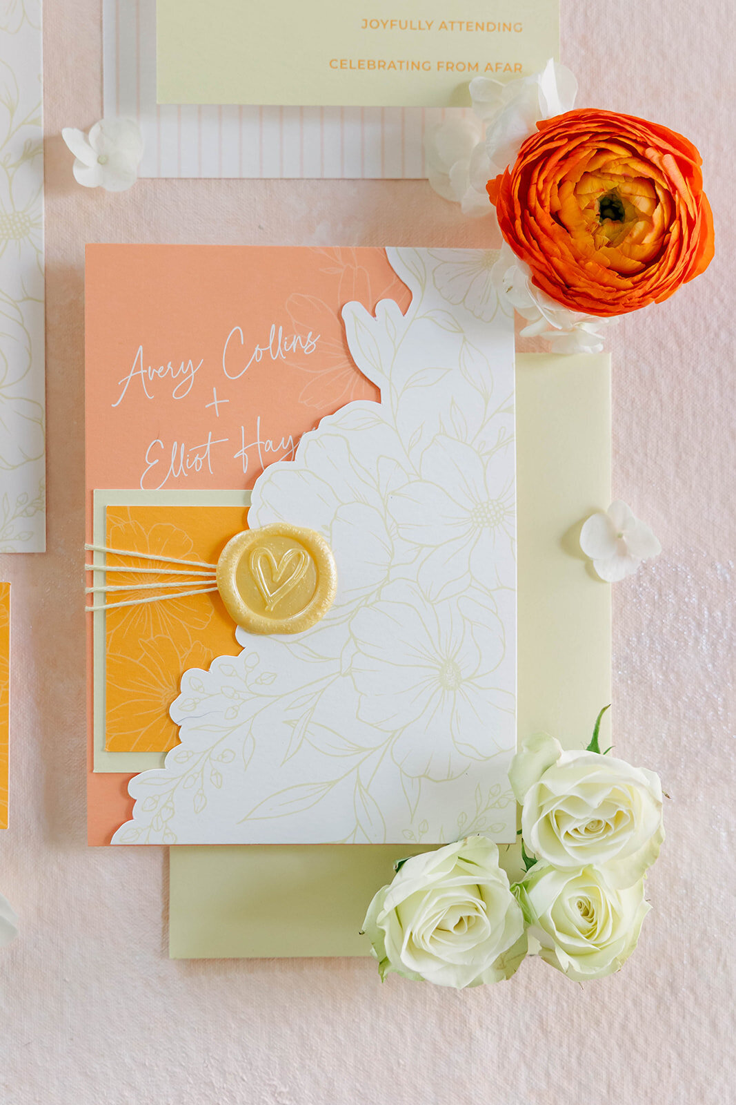 citrus-wedding-suite-with-wax-seal-and-flowers