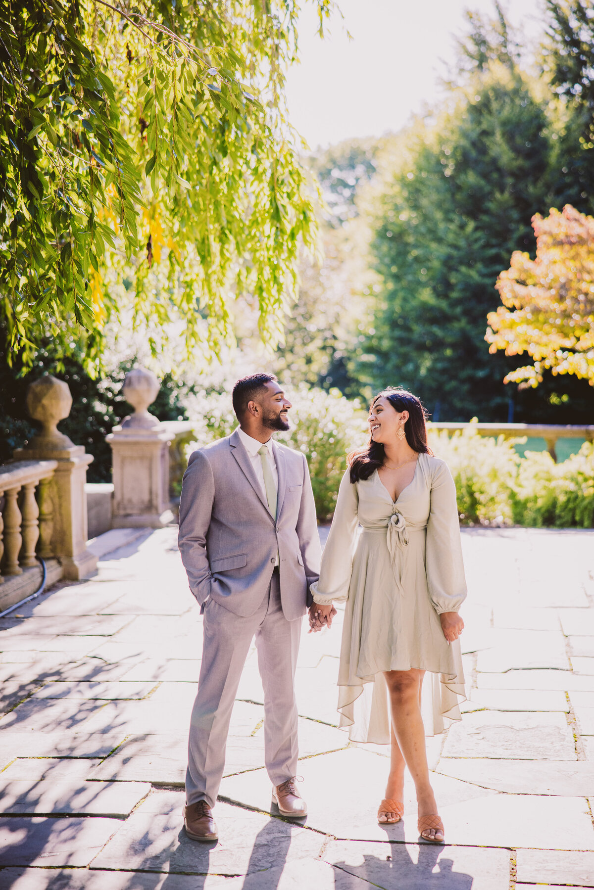 A couple sharing a moment inside the planting fields arboretum in oyster bay ny