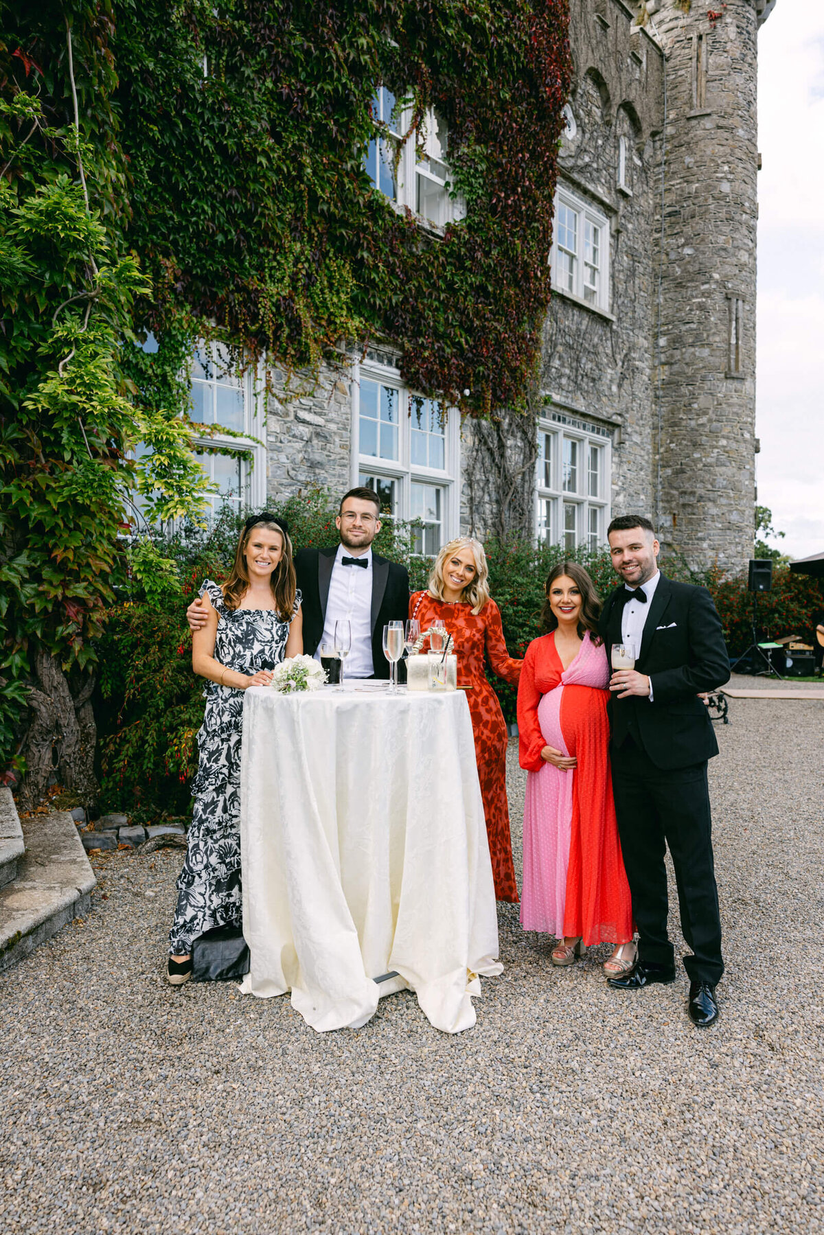 A candid wedding photo of guests during cocktail hour at a wedding at Luttrellstown Castle