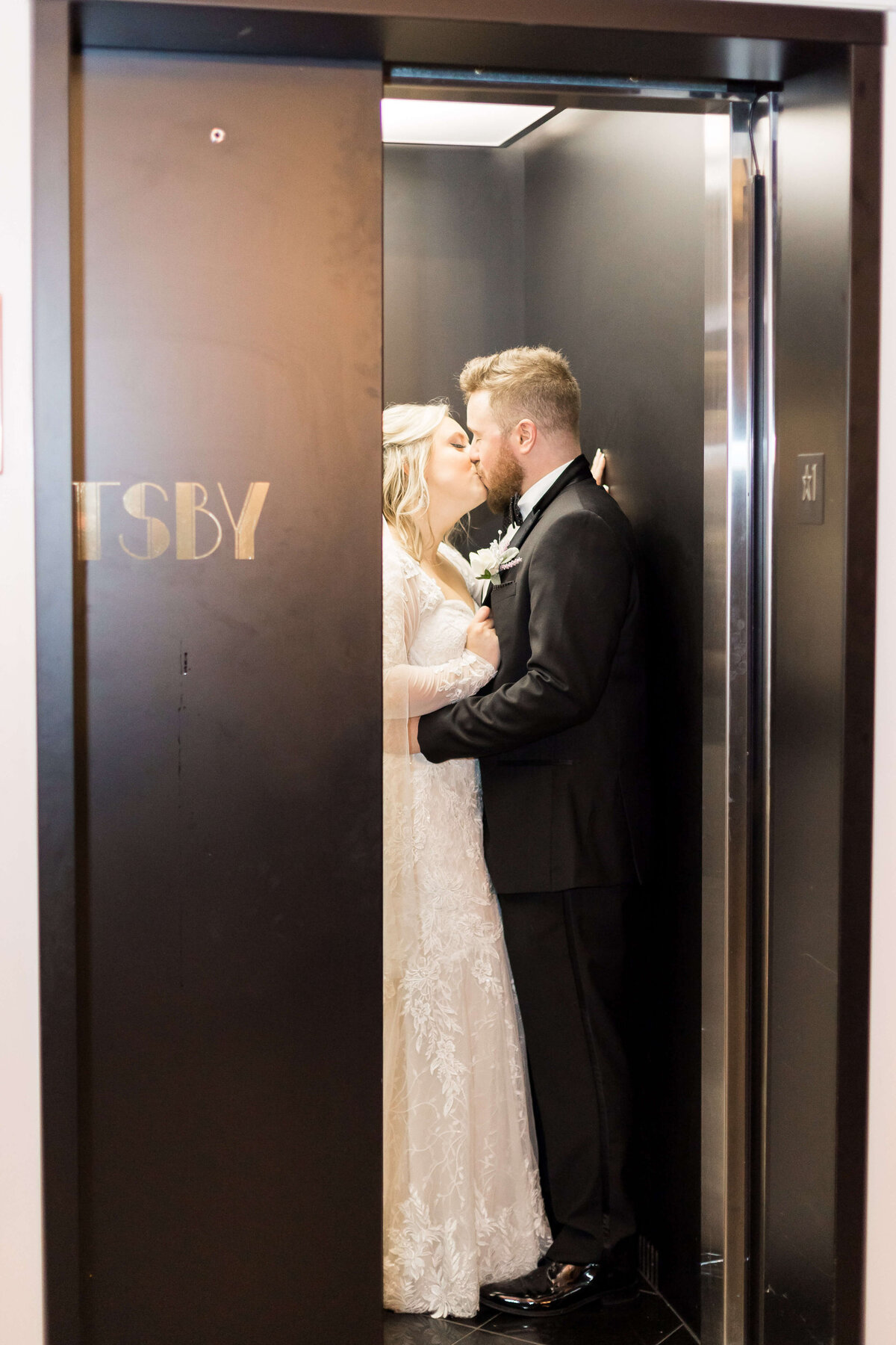 Bride and groom kissing at  The Gatsby in Shelbyville,KY