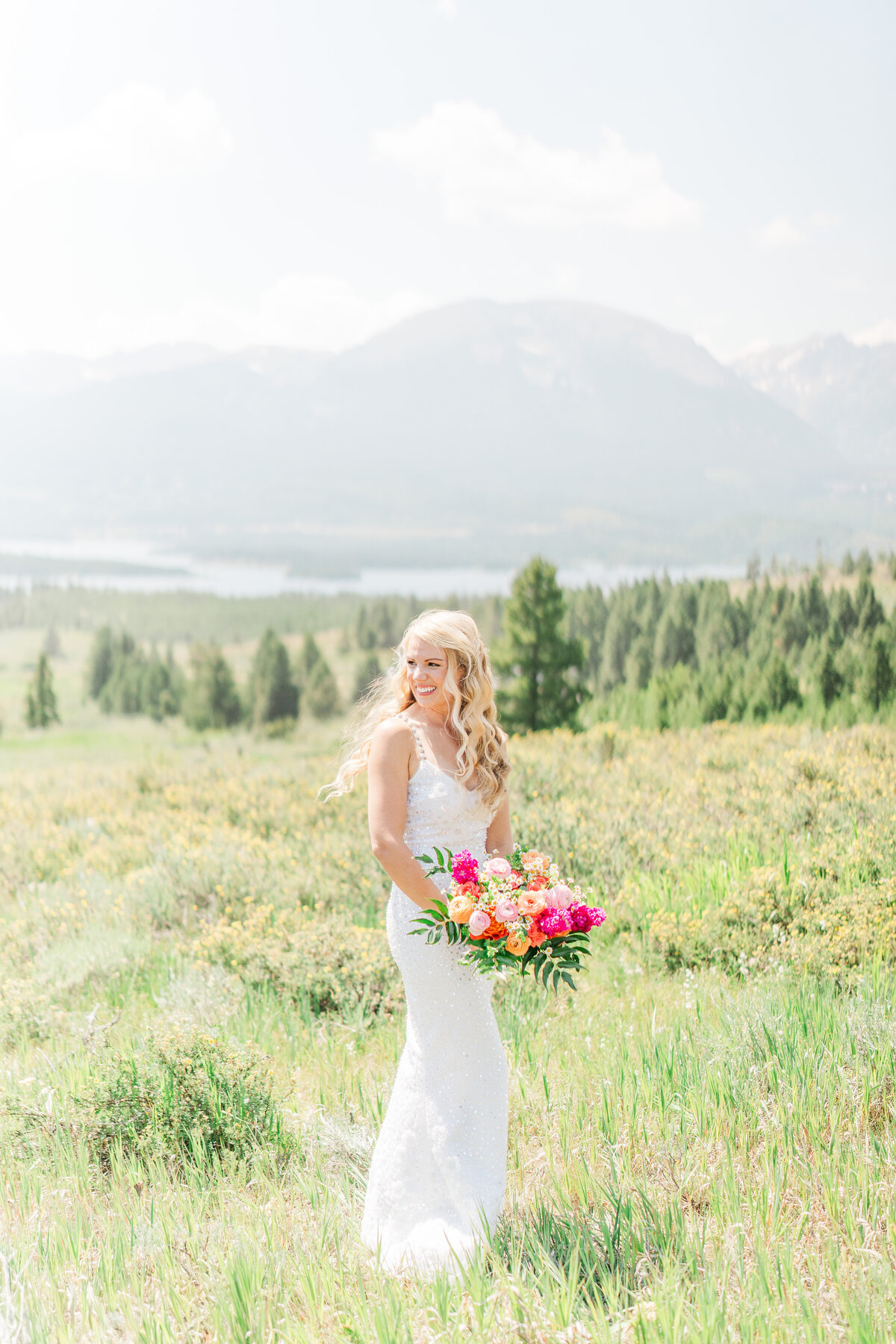 Lake Dillion Reservoir Colorado Elopement Wedding Mountain View Summer Pink and Orange Florals Sparkly Dress Light and Airy Elena Spraguer Photography0073