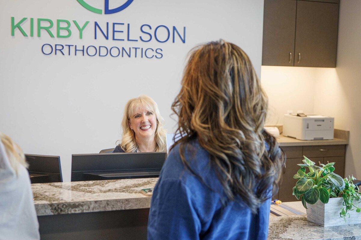 ortho front desk smiling