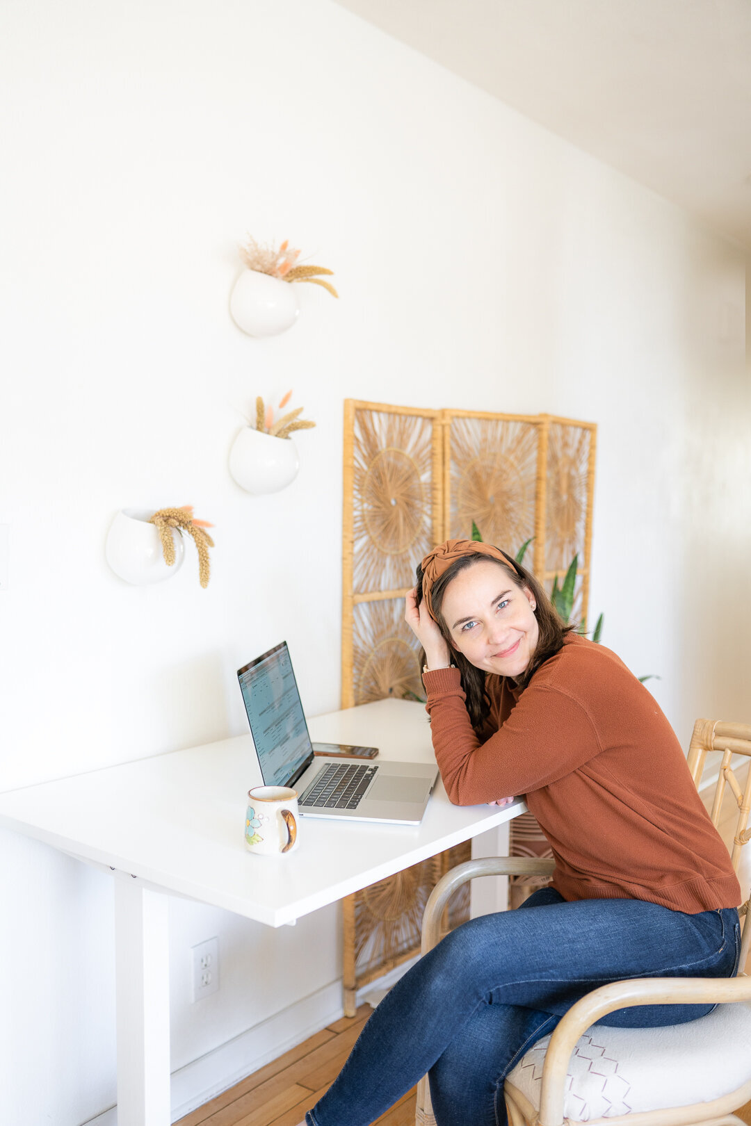 Photographer editing photos in her home office