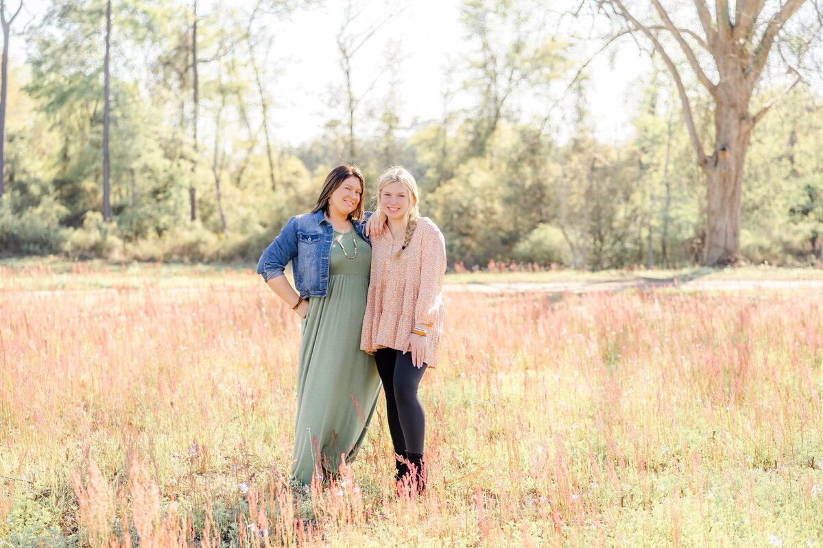 Golden hour sibling photo shoot in field in georgia with gorgeous fall colors
