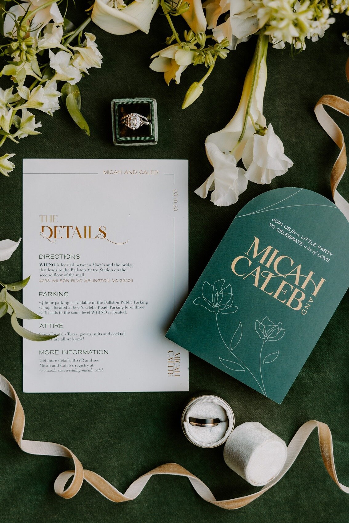 Flat lay of elegant wedding invitation and wedding ring