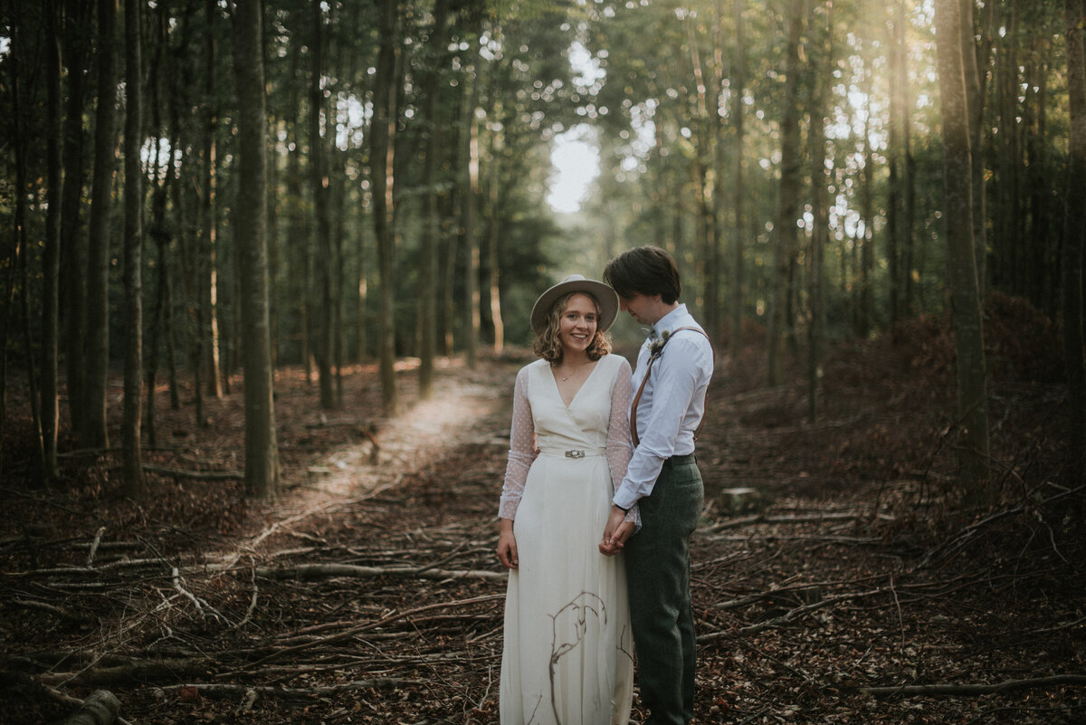 Couple Standing in the woods