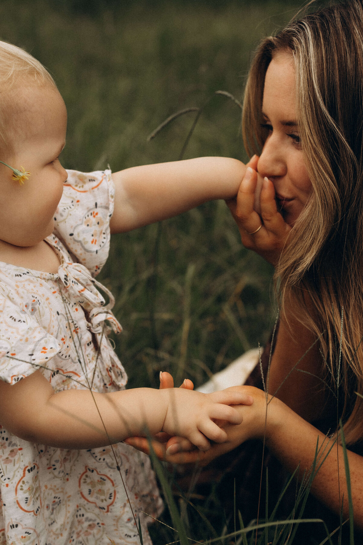 mother-kissing-childs-hand-emotive-motherhood-photo-sunshine-coast