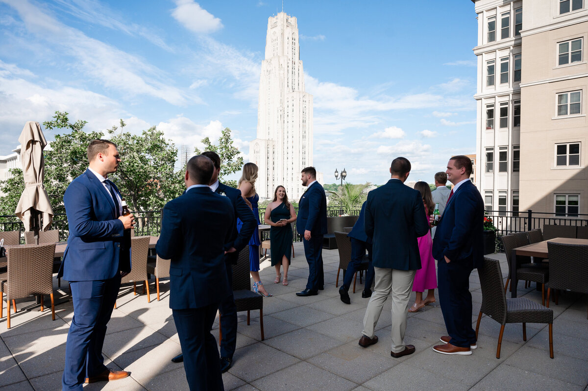guests mingling at a cocktail hour on the rooftop terrace of university club pittsburgh