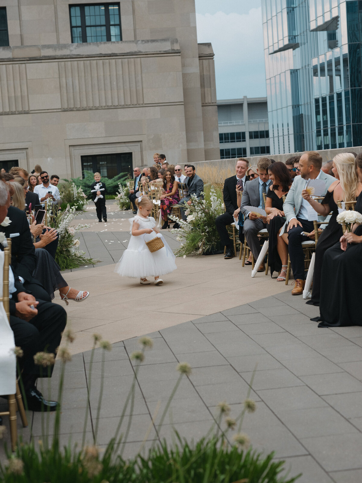 Sophisticated editorial wedding photography at Old Post Office Chicago featuring Lauren Alatriste's fashion forward approach to ceremony coverage, creating magazine-worthy imagery that combines architectural grandeur with authentic wedding
emotion.