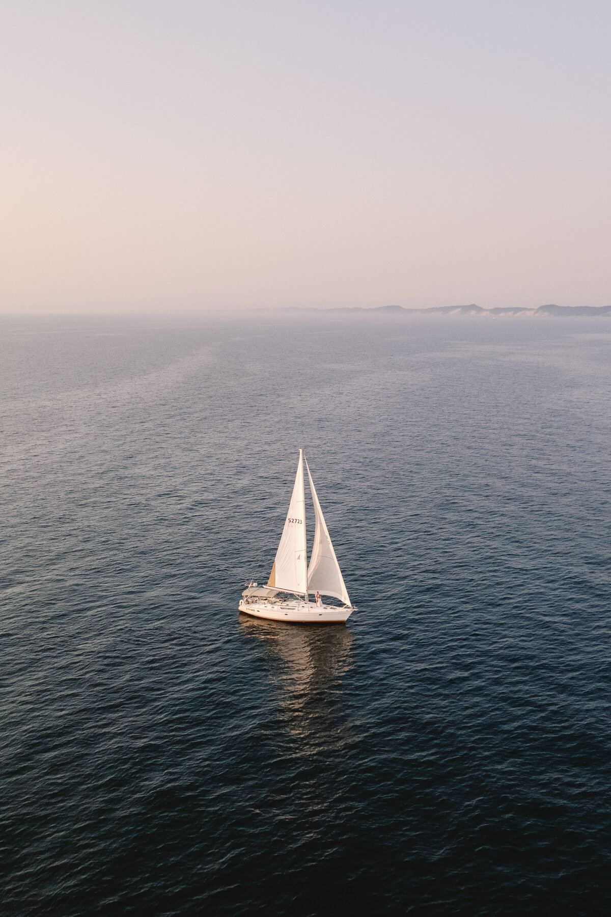 K+T Sailboat Lake Michigan Engagement Photos 18