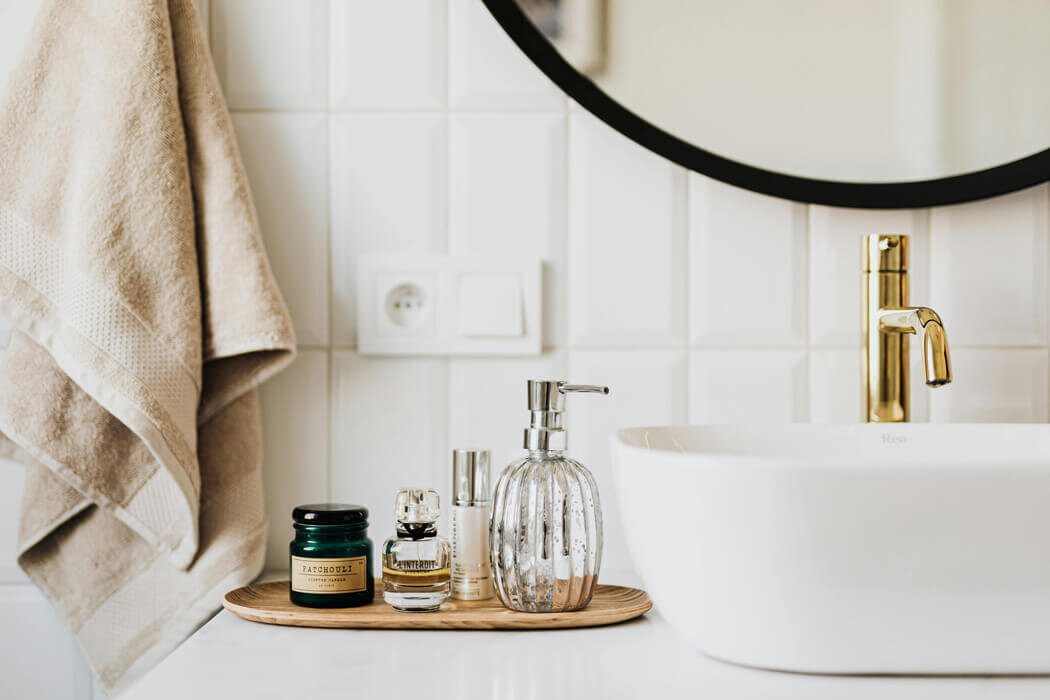 Clean bathroom sink and soap dispenser