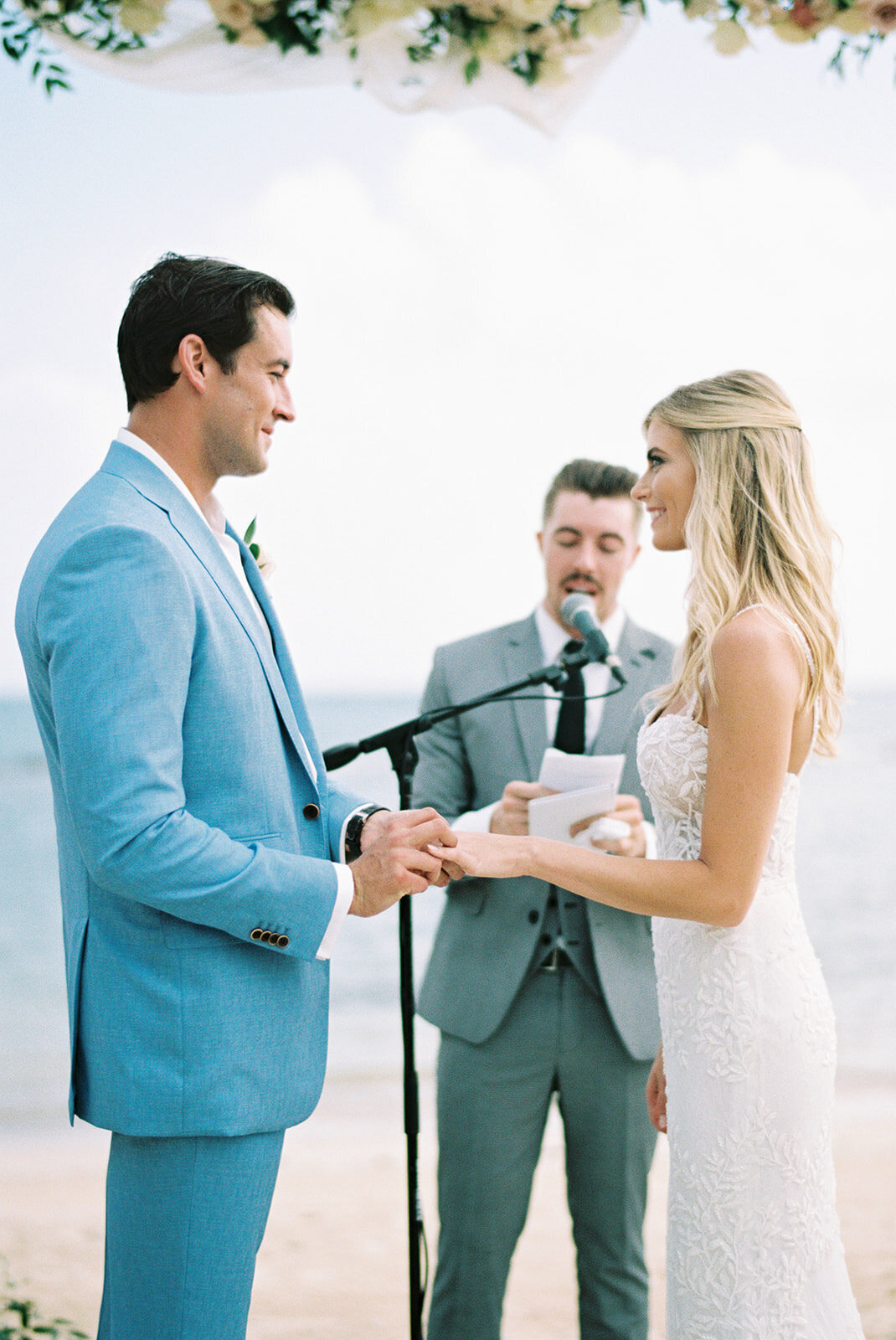 Beach elopement with modern couple at the alter