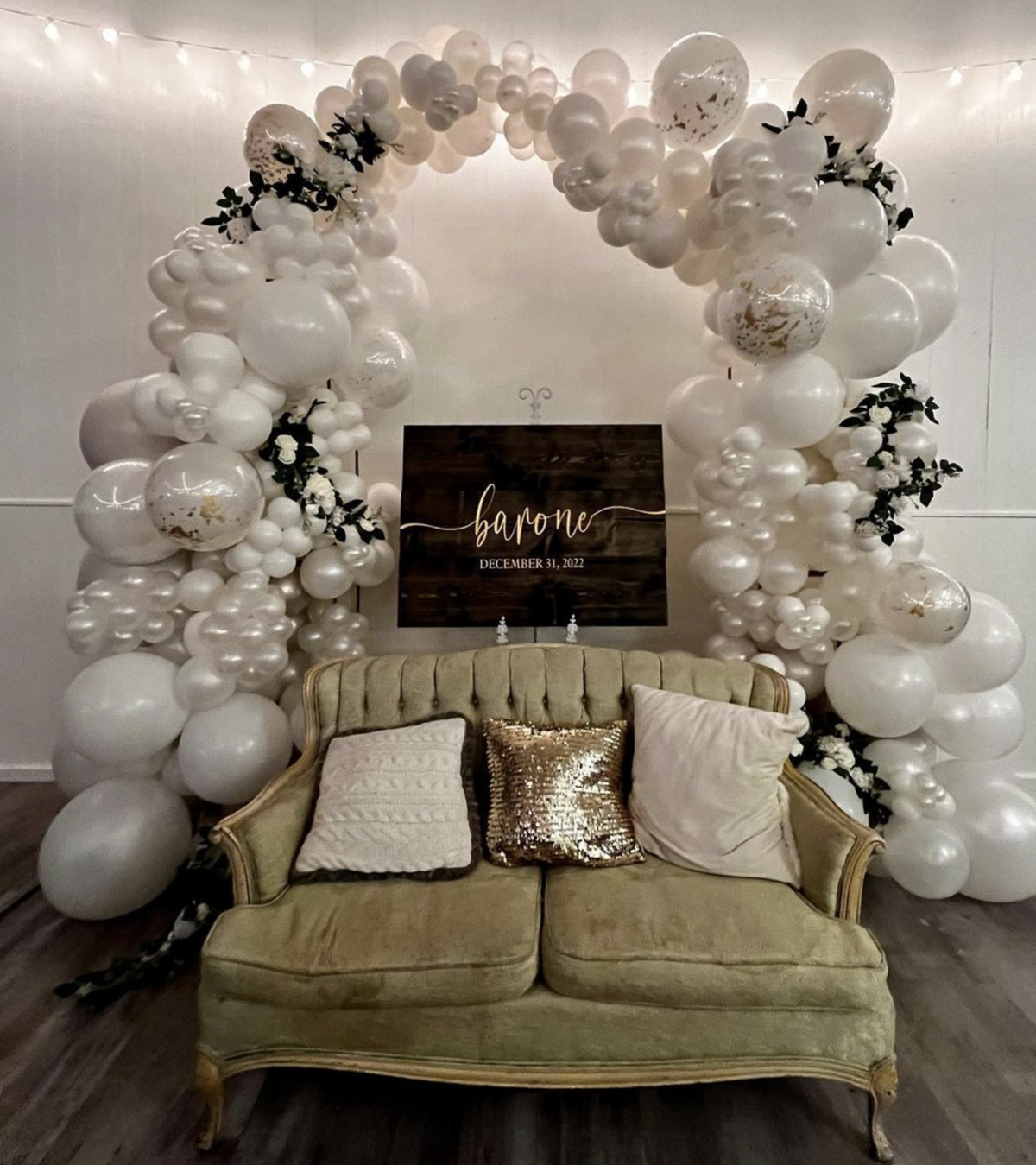 Cozy lounge setup with neutral balloons for weddings or bridal showers.