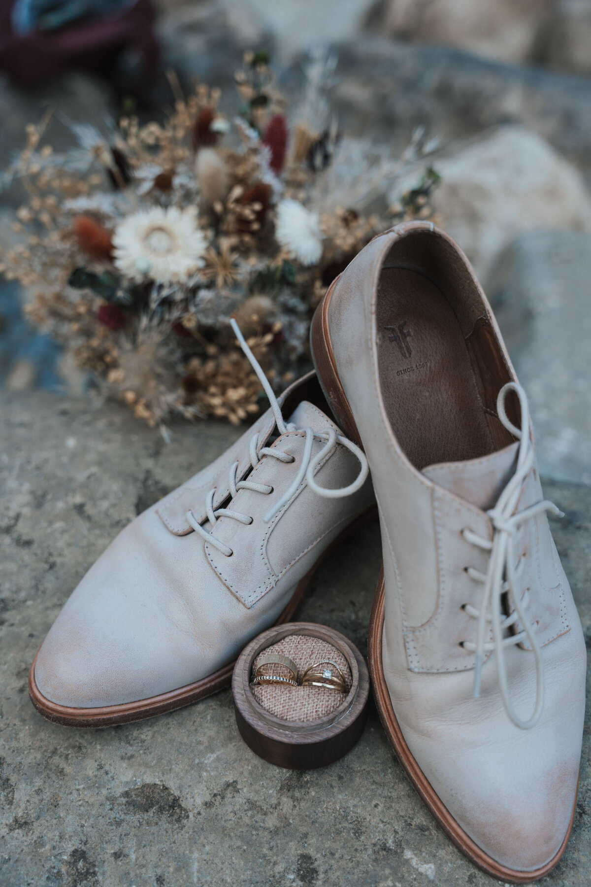 Wedding shoes, bouquet, and band spread 