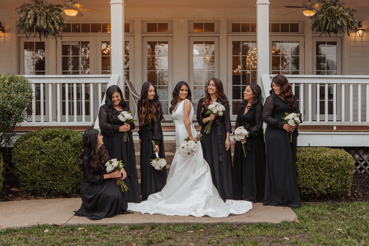 Chic KC Wedding Bridesmaids in Black Dresses at Hawthorne House in Parkville Missouri