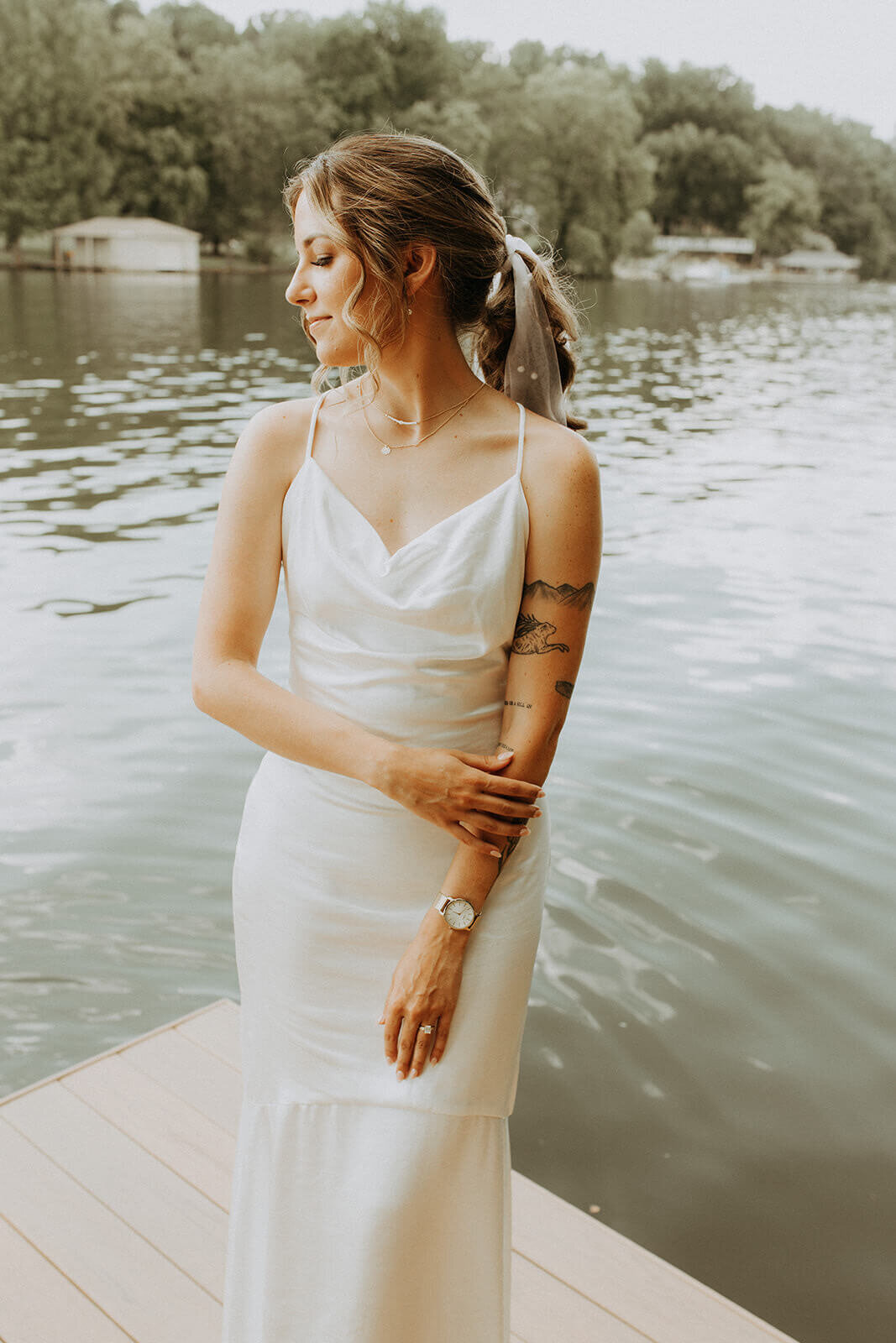 bride in classic gown by Tennessee River