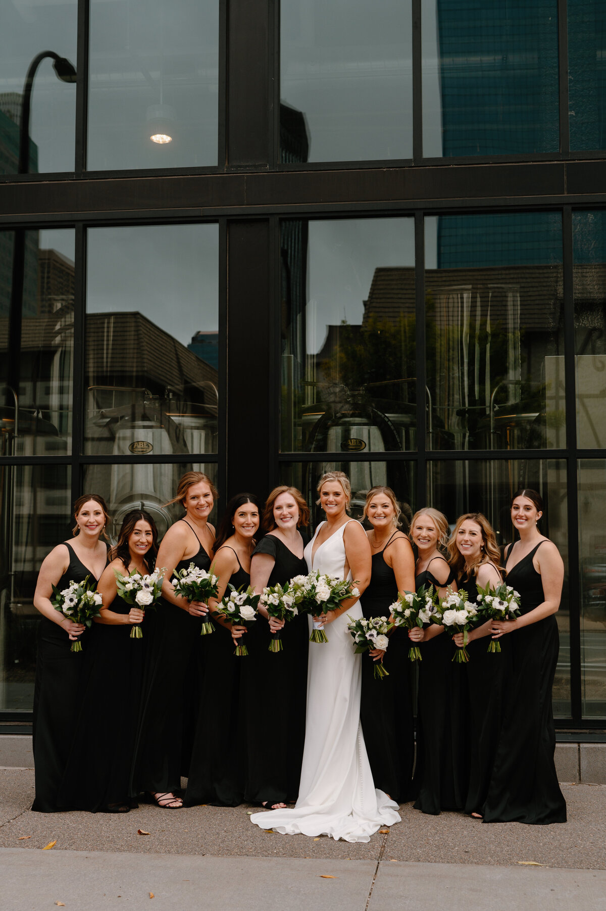 bridesmaids-black-dresses-neutral-wedding