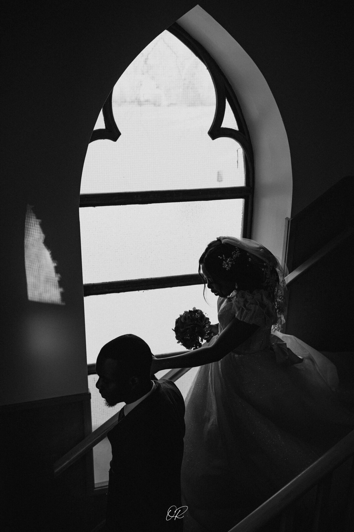 Silhouetted portrait of bride and groom in stairwell, by Stunning bridal portrait by OR Imagery, authentic and intimate wedding photographer in Calgary, Alberta. Featured on the Bronte Bride Vendor Guide.