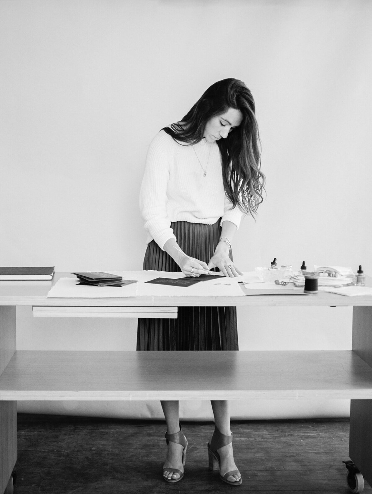 female business owner, calligrapher, artist, stationer with desk, brand photoshoot