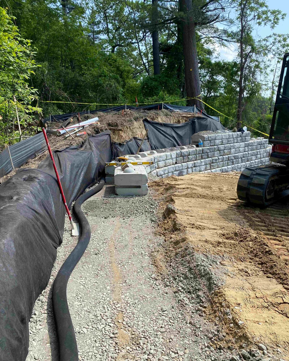 lake-orion-beach-redi-rock-retaining-wall-installation