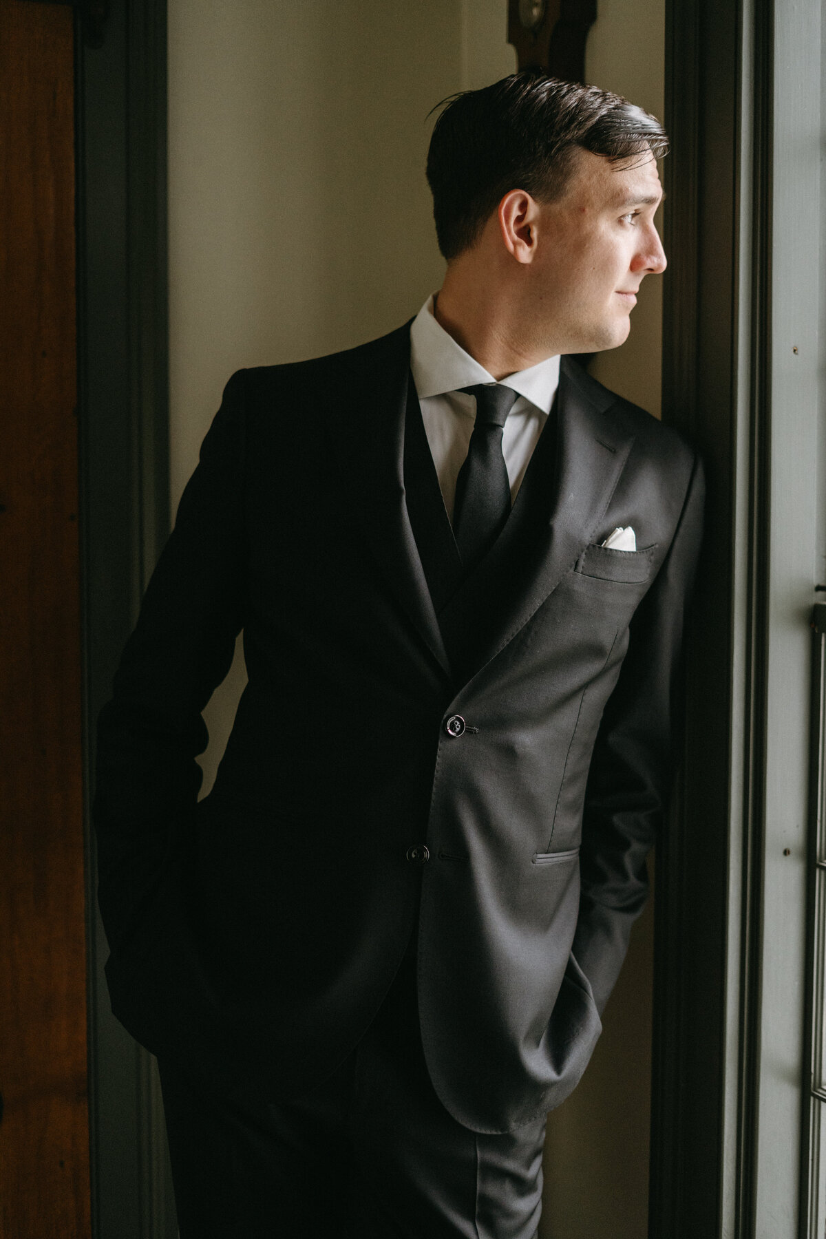 smith-farm-garden-groom-suit-classy-wedding