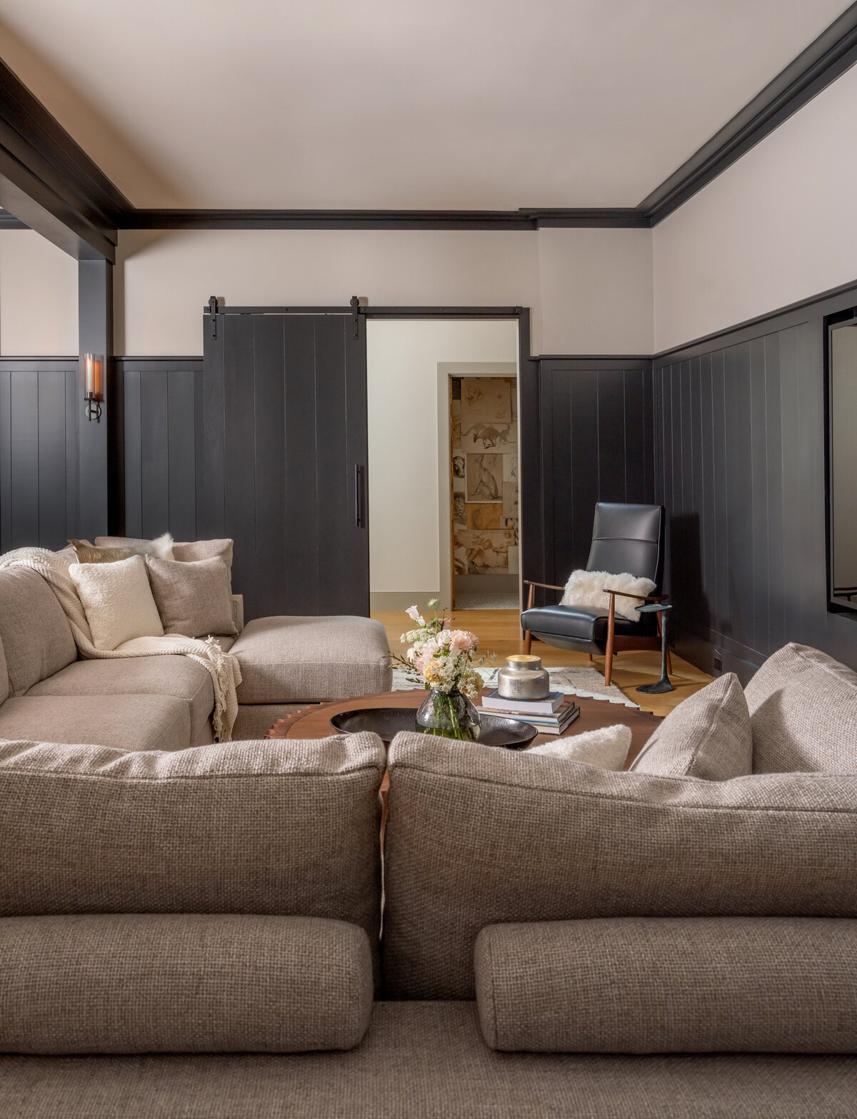 blue wood walls in living room with sitting area