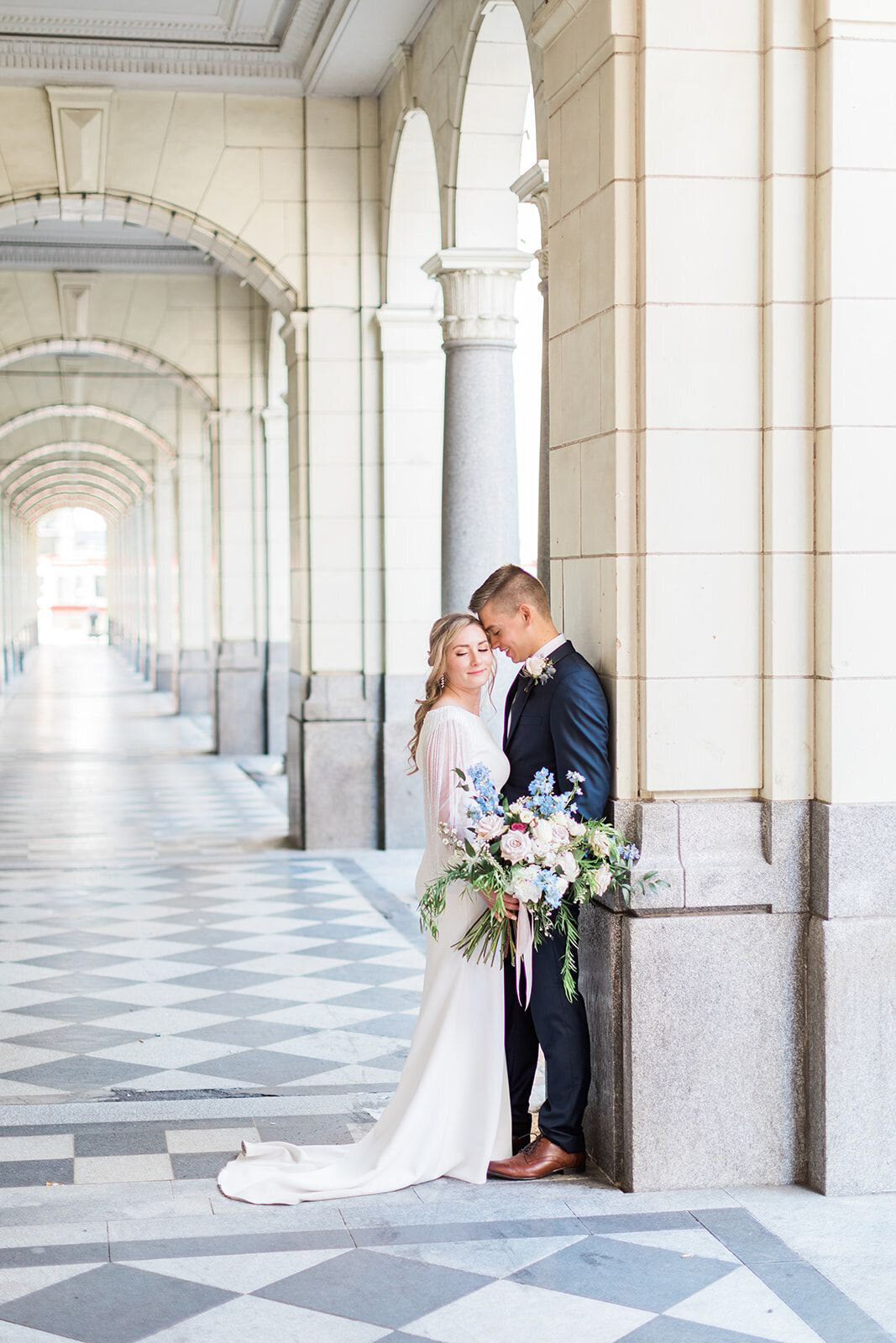 Classic and elegant couple in downtown Calgary captured by Jennifer Chabot Photography, classic and romantic wedding photographer in Calgary,  Alberta. Featured on the Bronte Bride Vendor Guide.