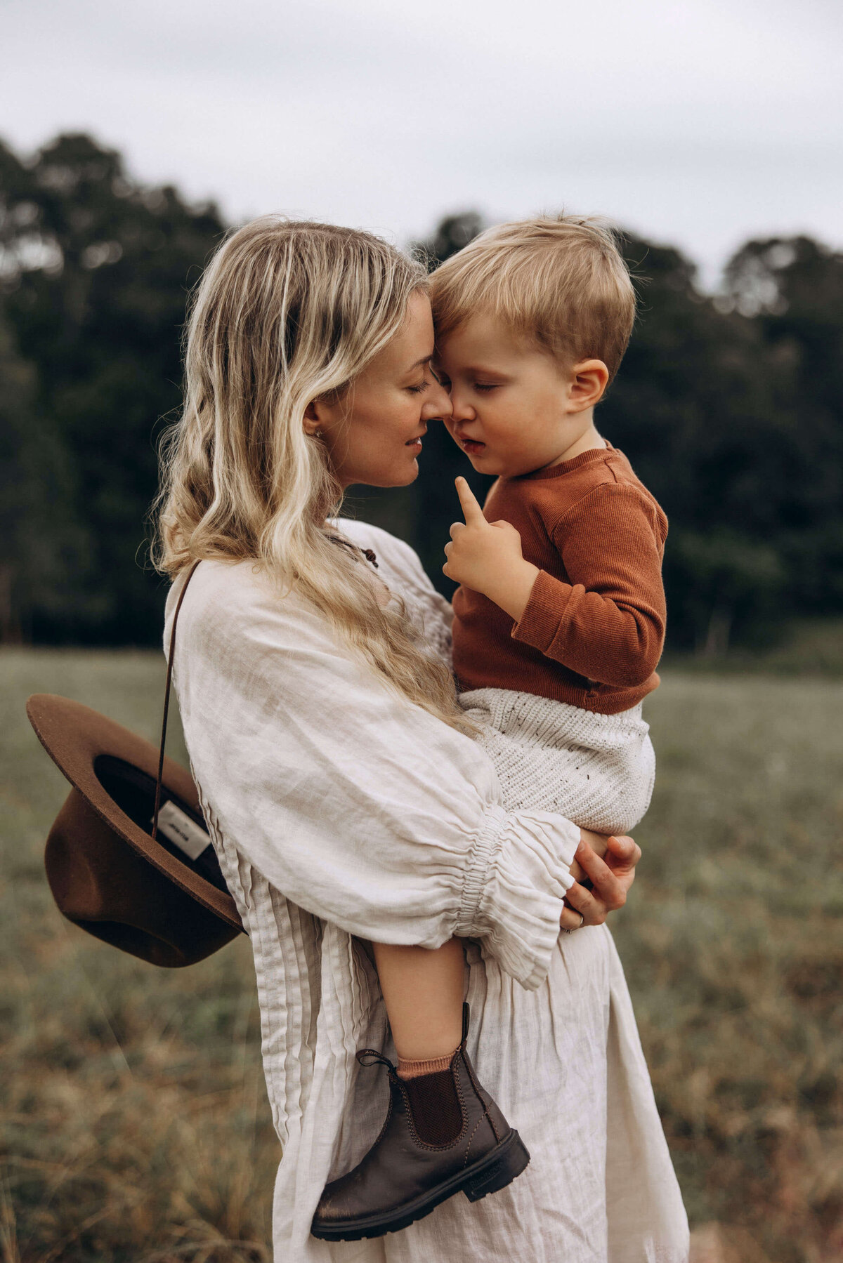 mother and son in a field