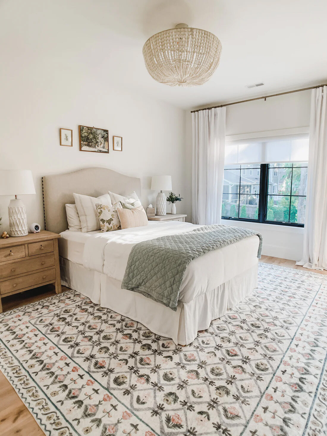 A little girl's bedroom gets an elegant update with a Loloi rug and neutral bedding