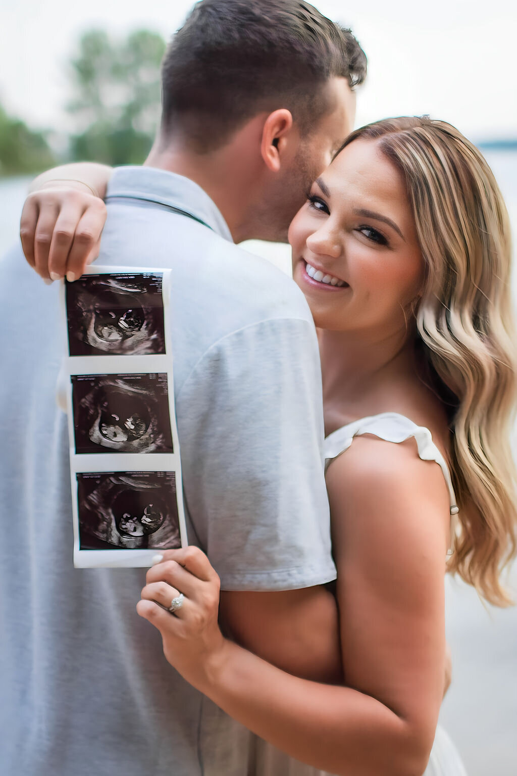 Couple making a pregnancy announcement maternity photo session in Lake Norman