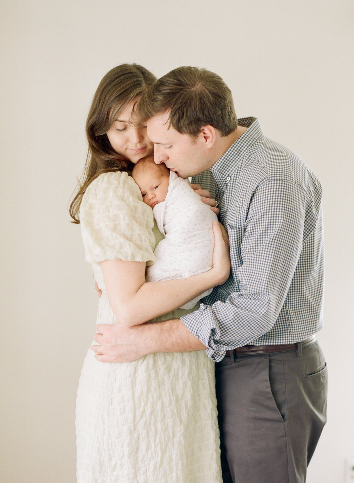 Family portrait from a newborn session in Charlotte NC. Image by Raleigh newborn photographer A.J. Dunlap Photography.