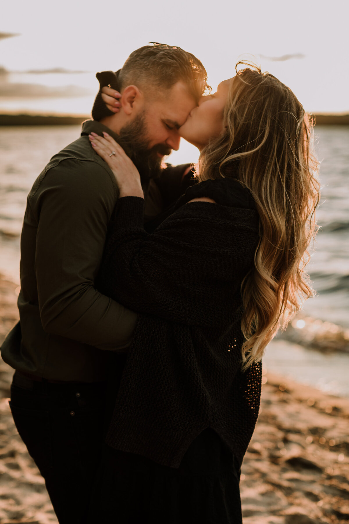 alana-andrew-engagement-cottage-beach-lake-sunset-dock-algonquin-24