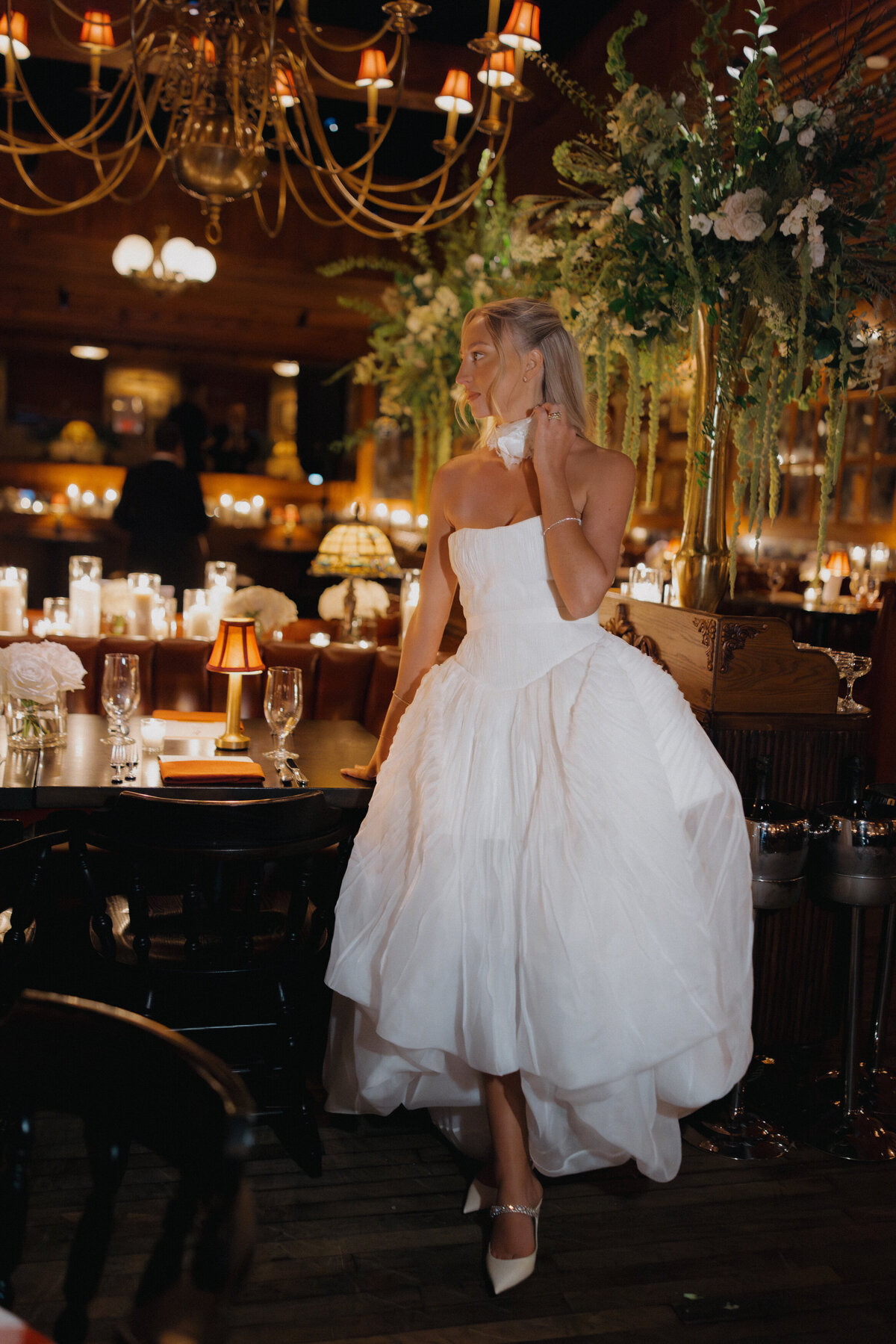 Sophisticated editorial wedding photography captures reception moments at Trivoli Tavern Chicago, featuring Lauren Alatriste's fashion forward approach combining magazine-worthy imagery with celebration energy and authentic wedding emotion.