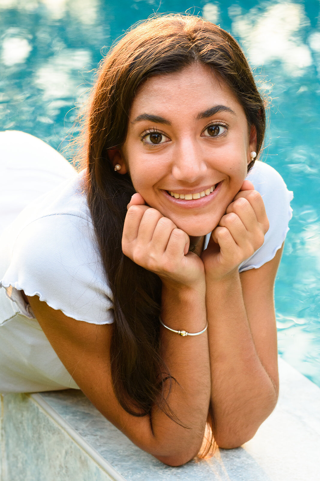 girl close by pool