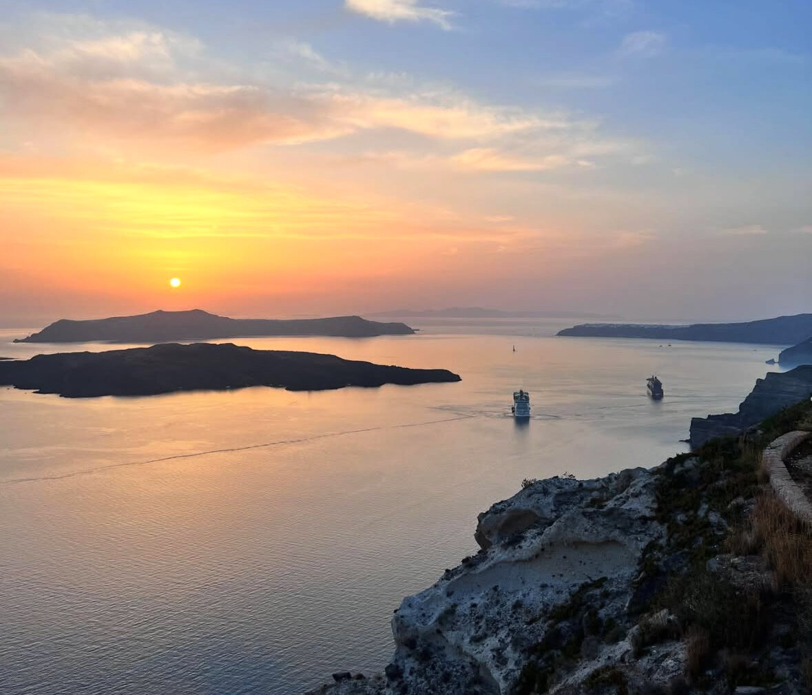 Sunset on Water with Cruise Boats