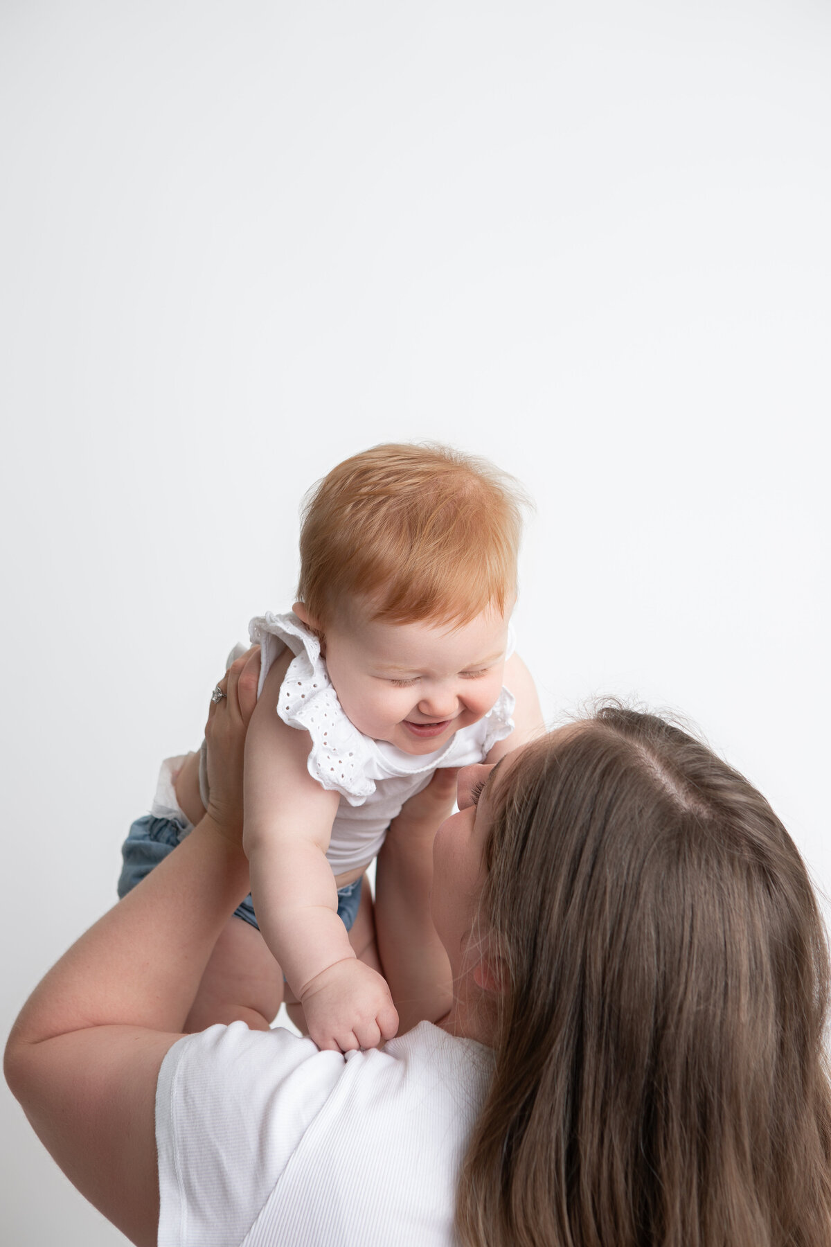 Mommy and me on white backdrop