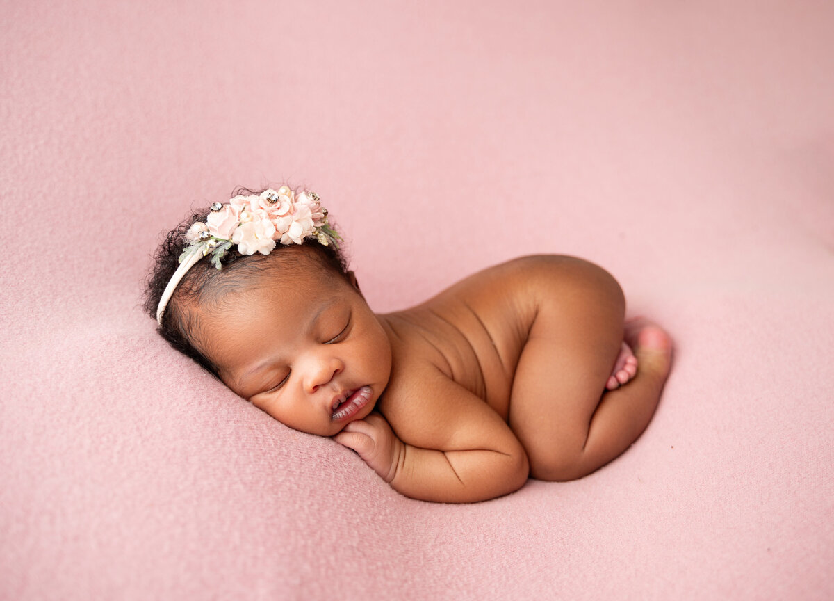 sleeping newborn baby girl