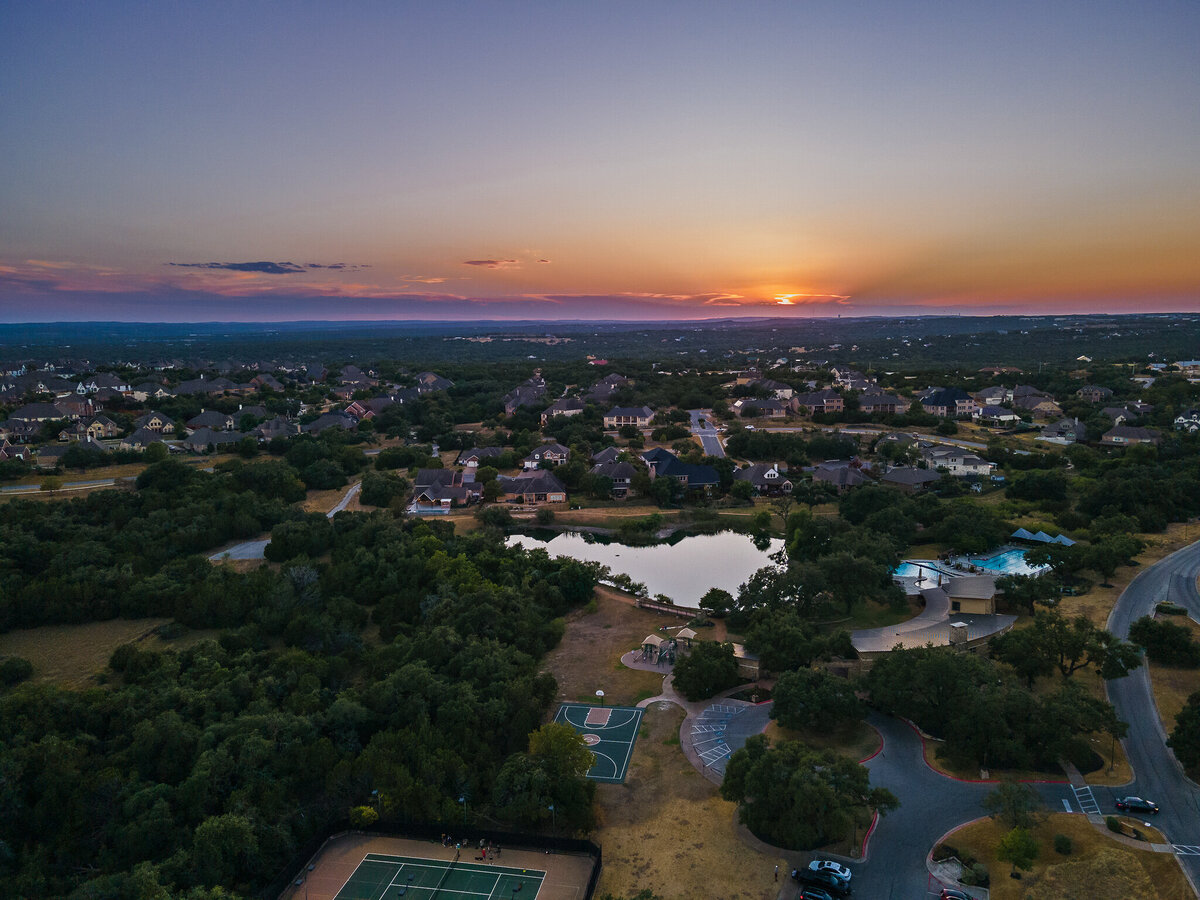 Sunset over Dripping Springs Texas taken by drone by Lydia Teague Photography.