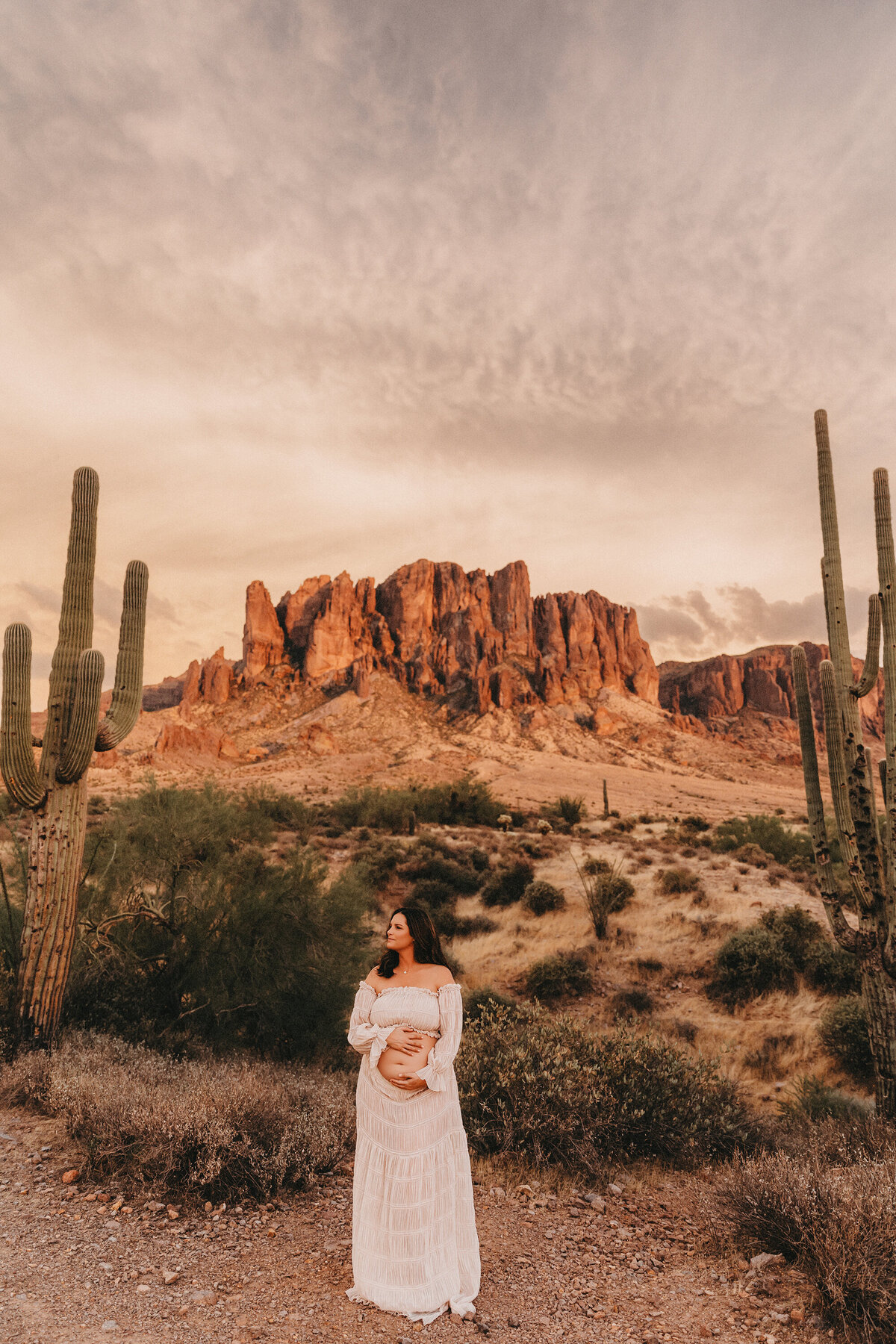 maternity session at lost dutchman state park for pregnant mom wearing two piece maternity dress