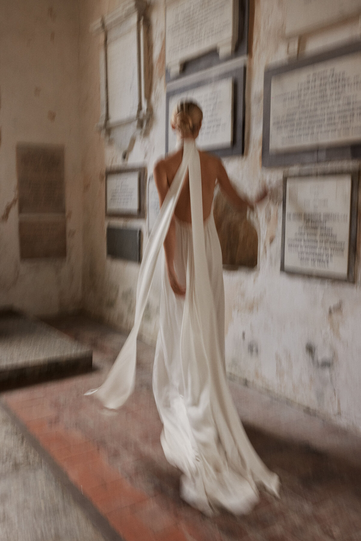 Benjamin Wheeler photography of bride wearing long, elegant high neck silk wedding dress