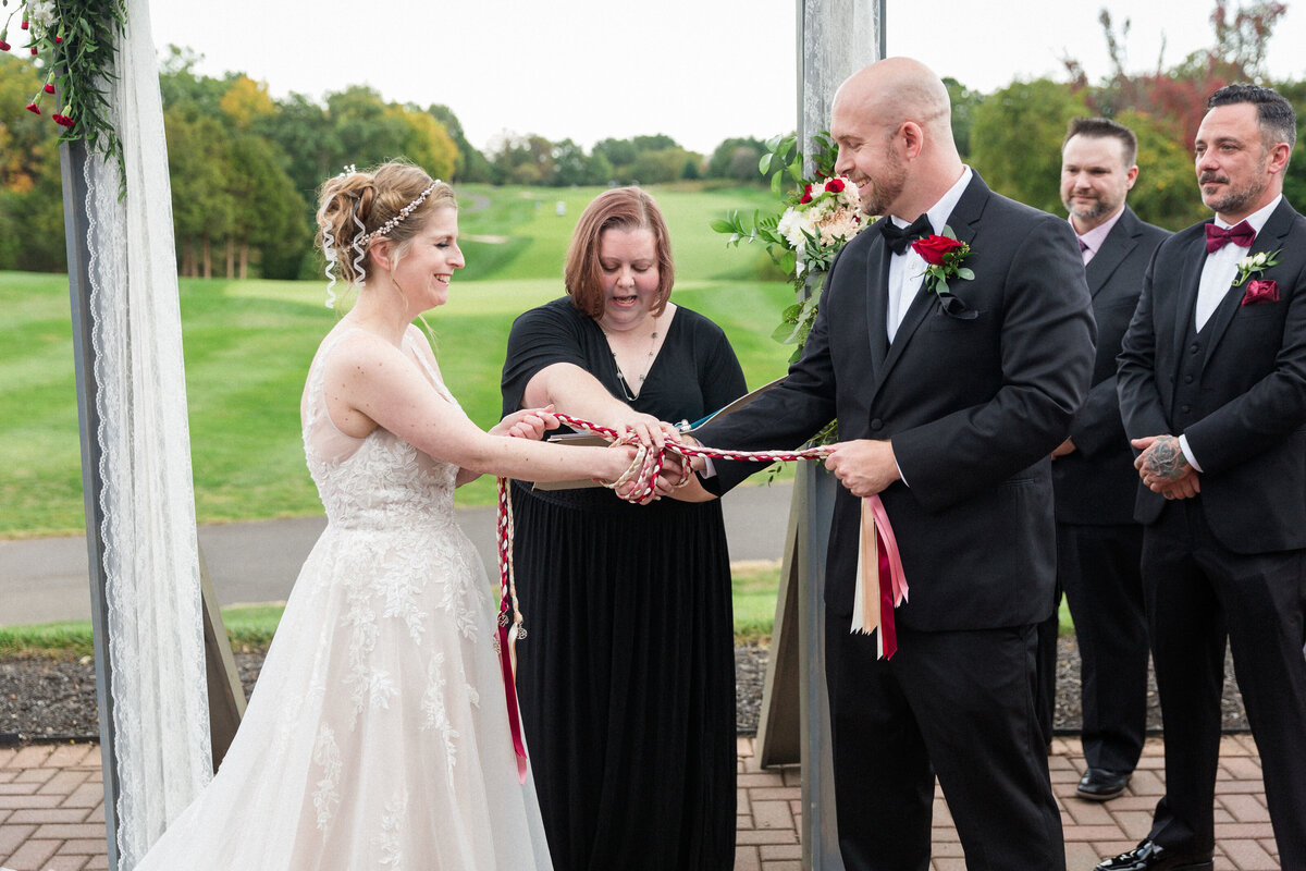bride and groom perform tradition professional photographer Fairfax County