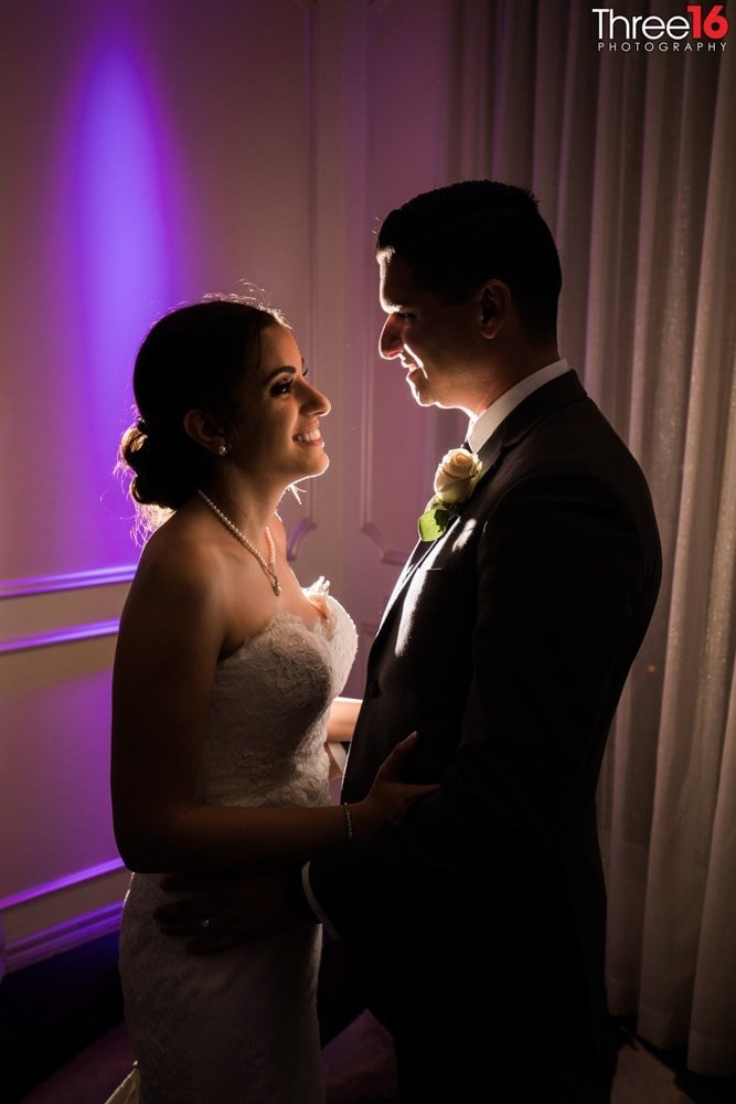 Bride and Groom stare at one another