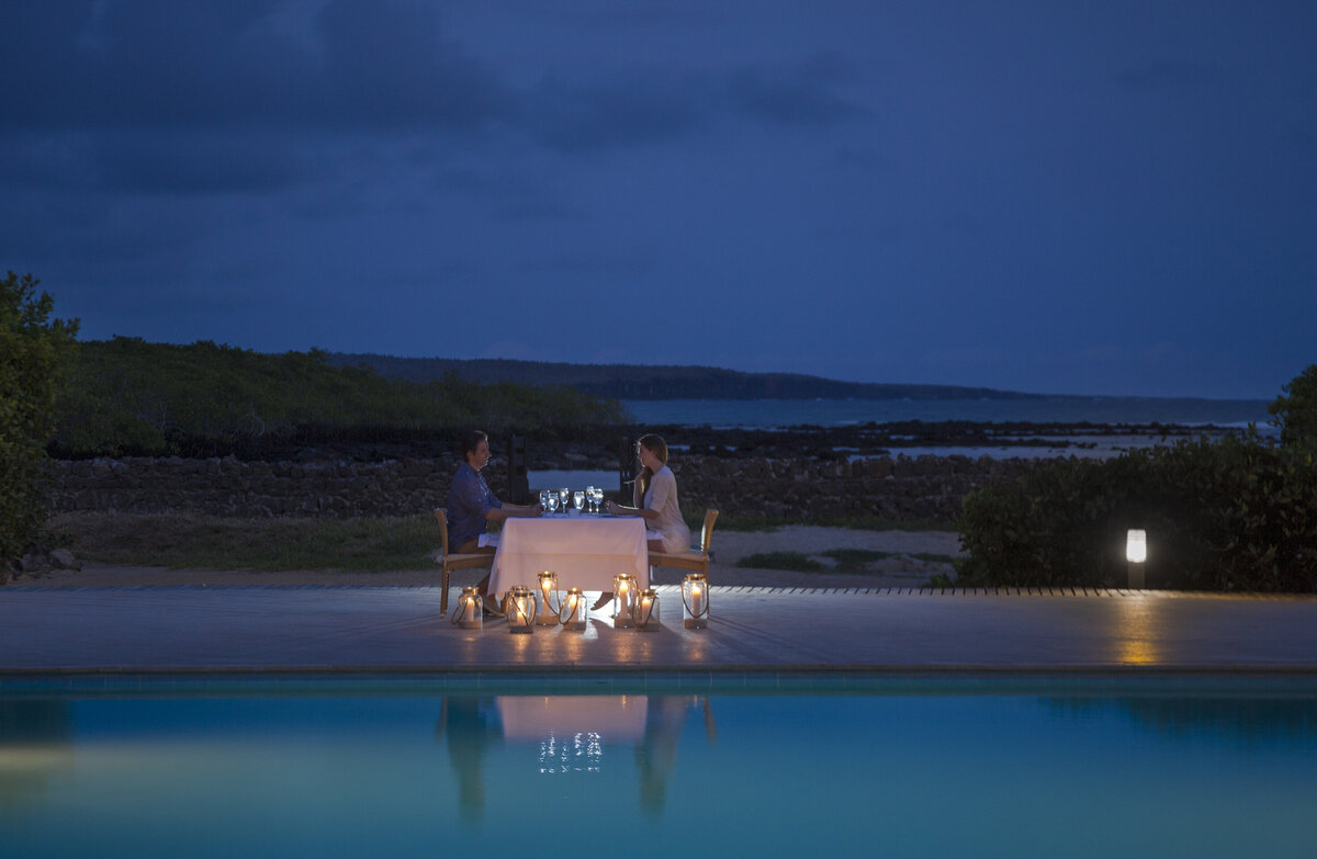 Waterstone - Finch Bay Galapagos Hotel - Santa Cruz Island - Luxury Boutique Hotel - FB00018-Finch-Bay-dinner-pool-candles