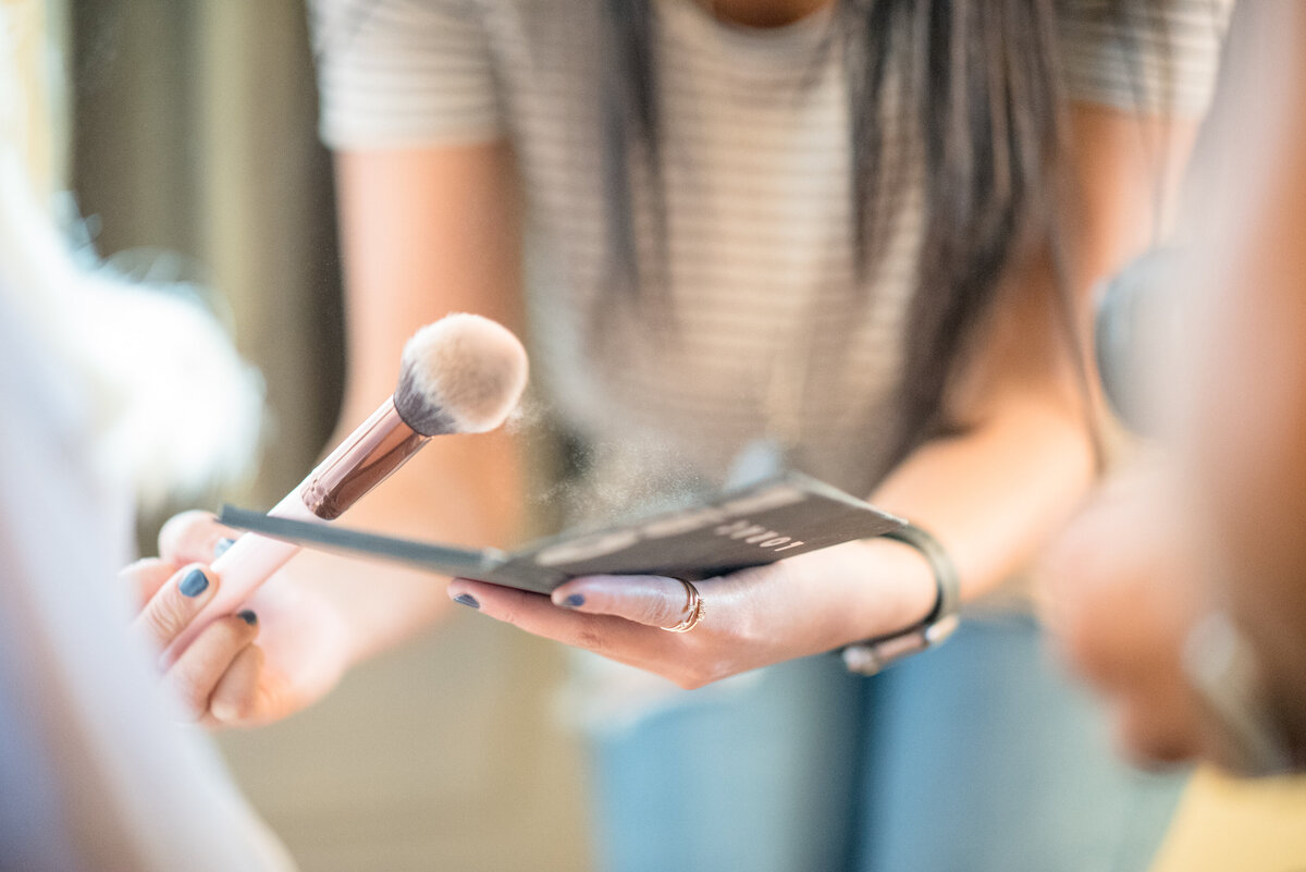 Canva - Woman Holding Makeup Brush
