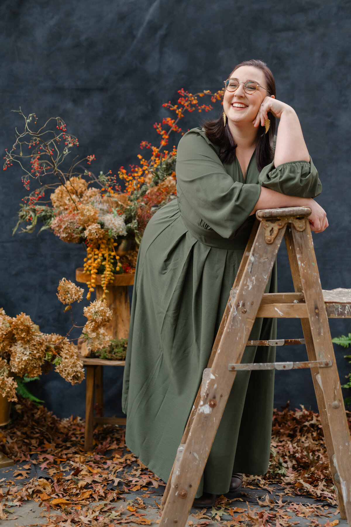 Rachel leaning against ladder