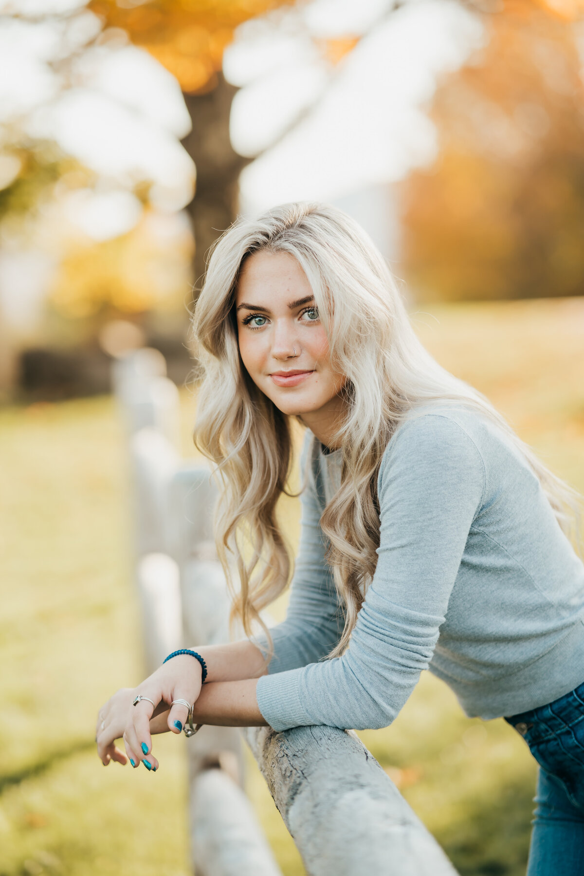 Vermont Senior Photography session with a young woman in a scenic outdoor setting.