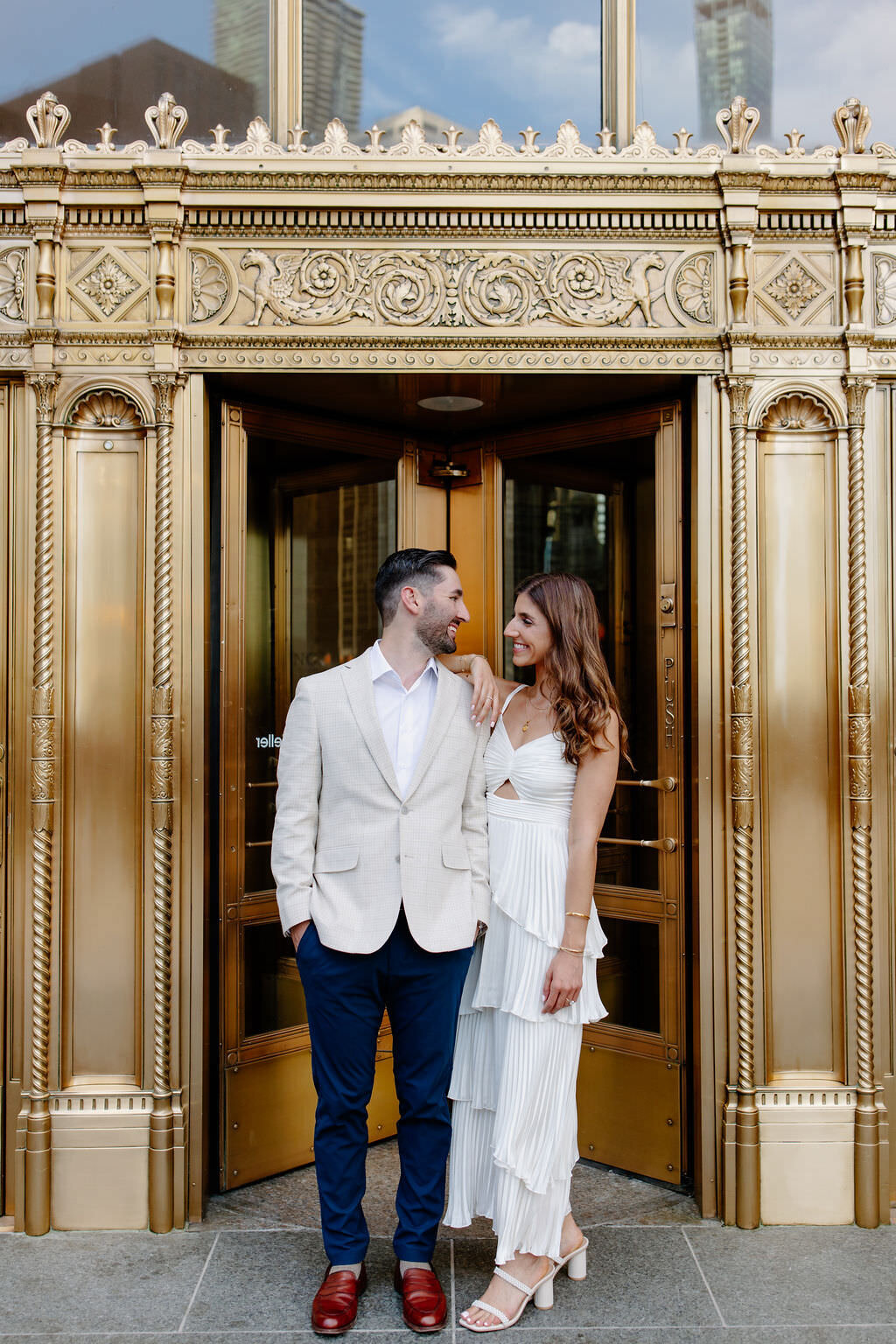 An engagement photography session at The Wrigley Building and North Ave Beach in Chicago, Illinois - 4
