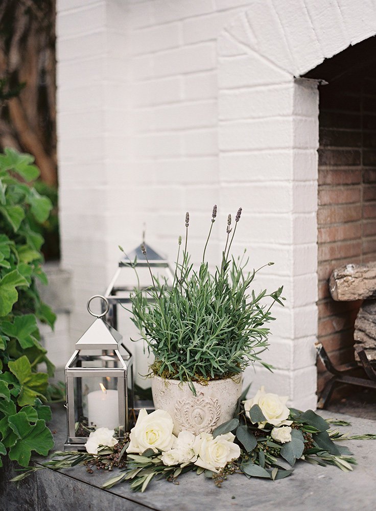 flowers and lanterns for fireplace